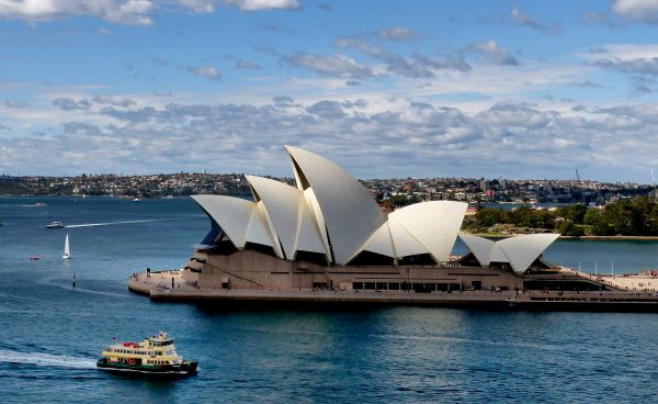 Sydney Opera House and Harbour Bridge seen across the water at dusk Sydney Opera House and Harbour Bridge seen across the water at dusk