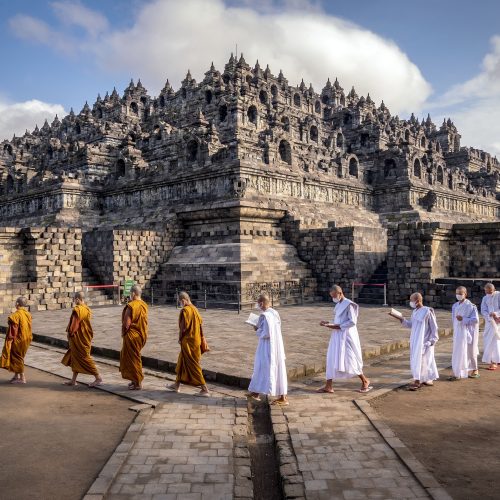 Stone stupas of Borobudur temple at sunrise in Central Java, Indonesia Stone stupas of Borobudur temple at sunrise in Central Java, Indonesia