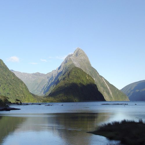 Mitre Peak rising above the water of Milford Sound, New Zealand Mitre Peak rising above the water of Milford Sound, New Zealand